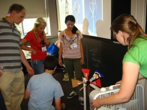 Brandon and Allison teach participants about their design. L-R: Brandon Mauch, Allie Tomlinson, Ben Stern, Abby Xie, Allison Weis