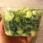 Chopped cucumbers, kale and broccoli.
